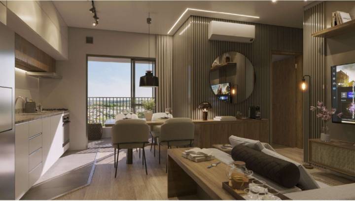 Sala de estar, jantar e cozinha integradas no apartamento