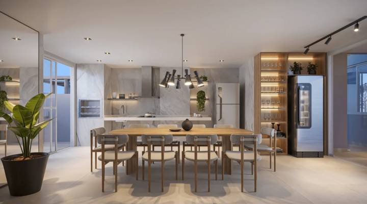 Espaço gourmet com cozinha e mesa central