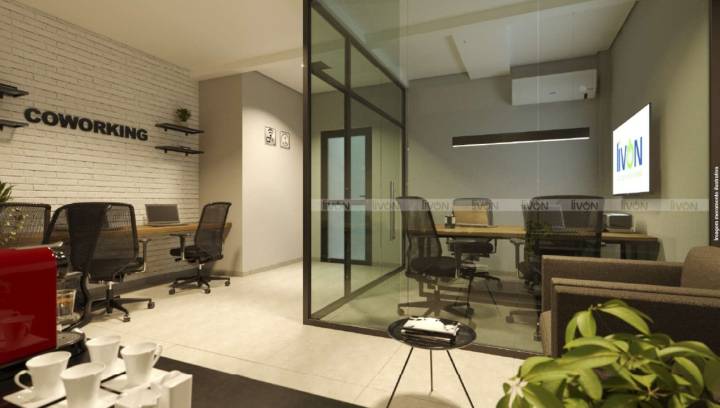 Coworking com estações de trabalho e sala envidraçada