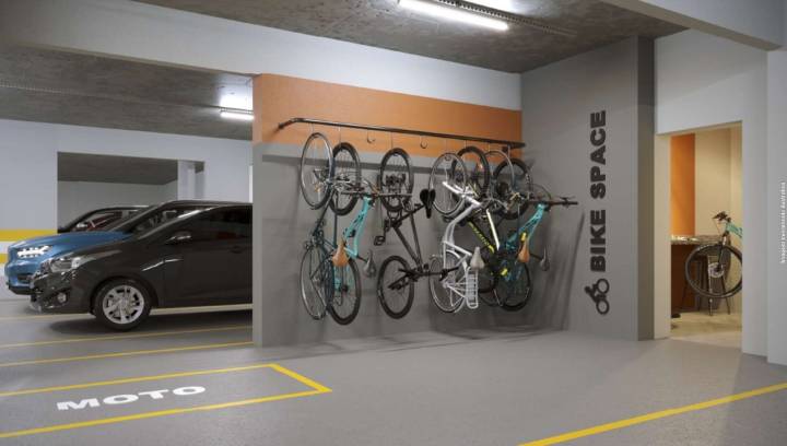 Bicicletário com suportes para bicicletas junto à garagem