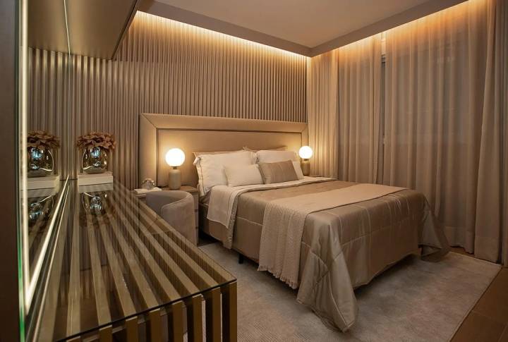Suíte master do Wide Nova Campinas decorado com cama de casal