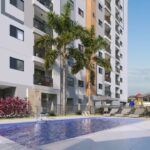 Piscina do Liv Mansões em frente à torre residencial