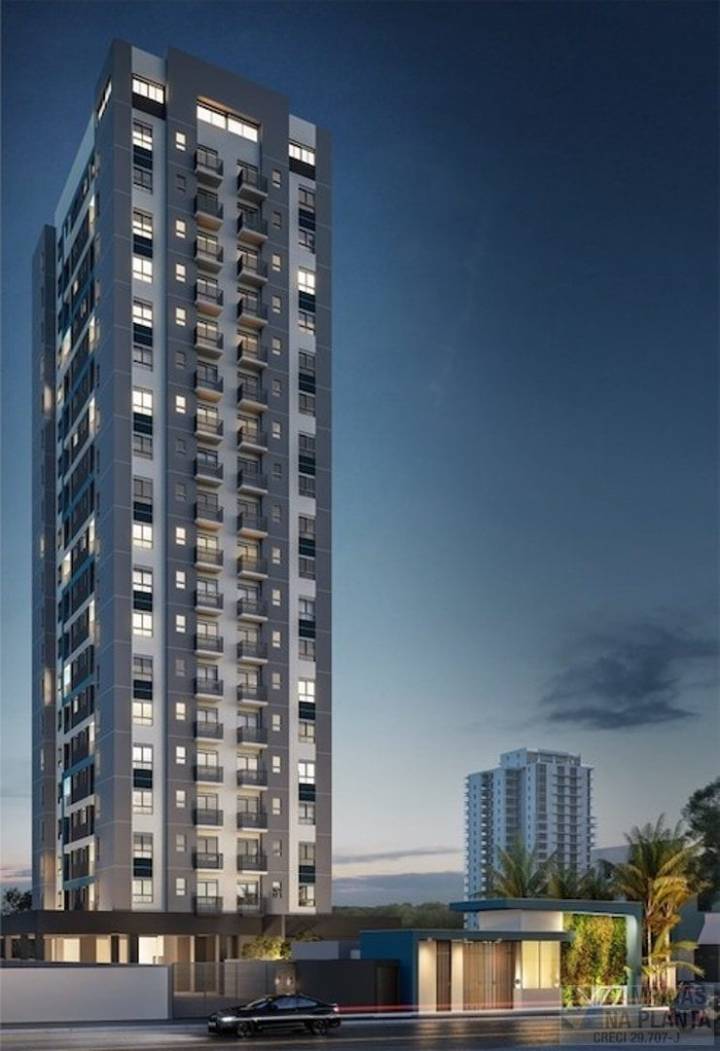 fachada noturna do vizzi