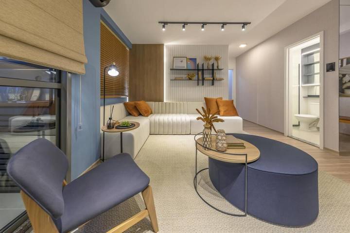 Sala de estar decorada do Brisas Bella Città com design moderno.