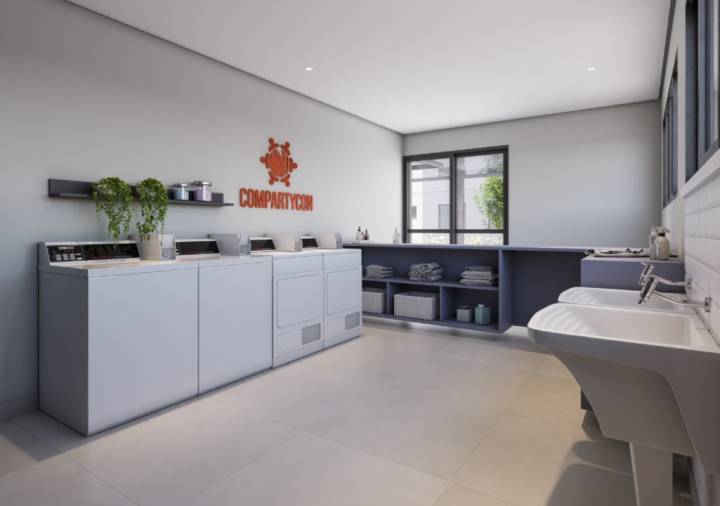 Lavanderia compartilhada do Brisas Bella Città equipada com máquinas profissionais.