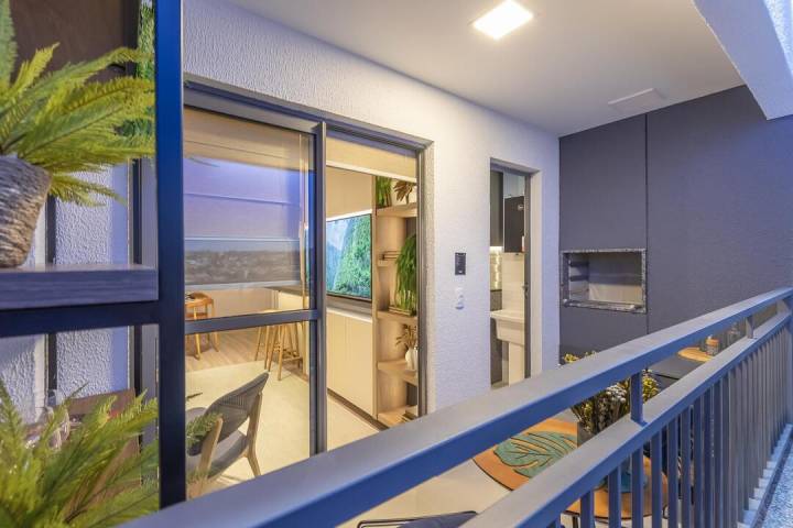 Sacada com churrasqueira do Brisas Bella Città, ideal para lazer.