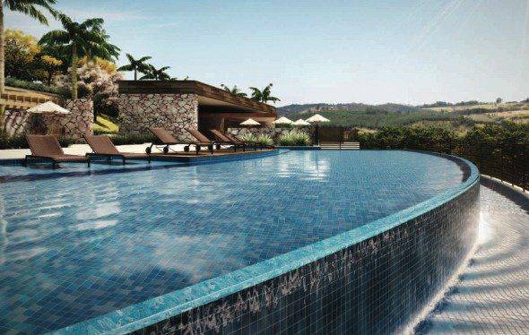 perspectiva do clube mostrando a piscina com borda infinita do entreverdes campinas lotes de alto padrão prontos para construir em Sousas