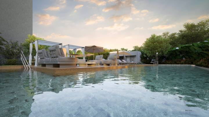 Piscina do Avenida 105 com deck e área de descanso.